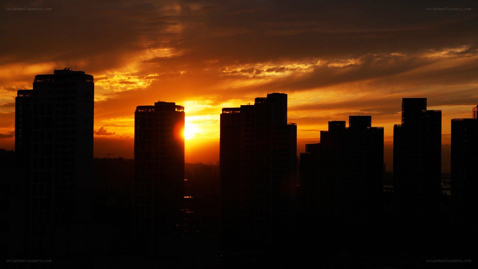 sunset over city skyline