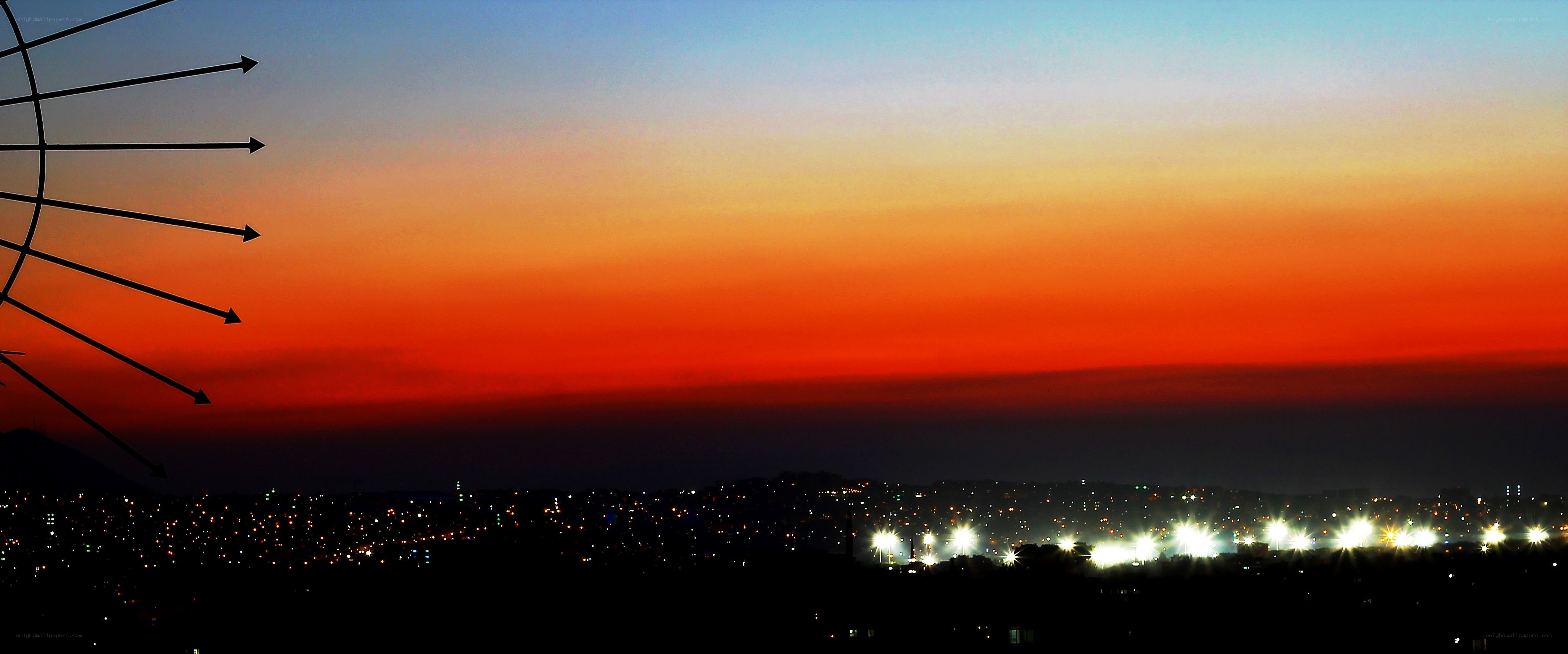 sunset over city skyline