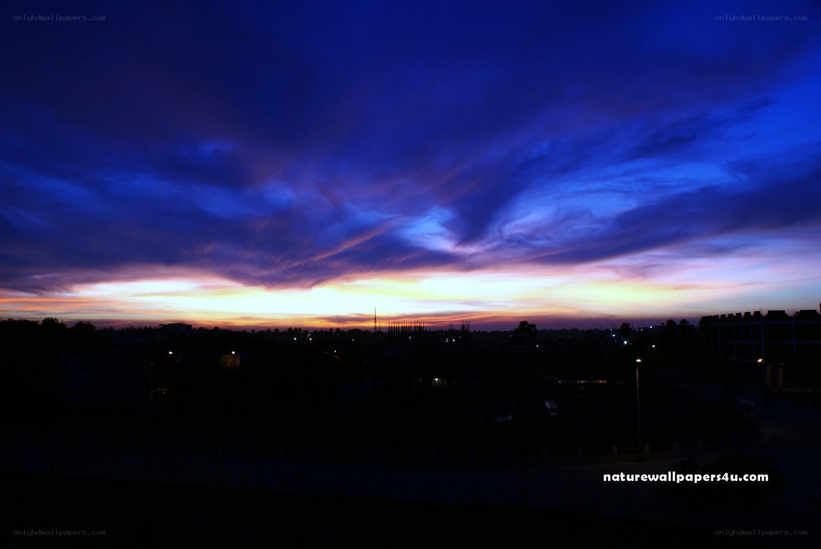 sunset over city skyline