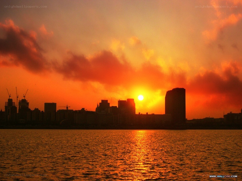 sunset over city skyline