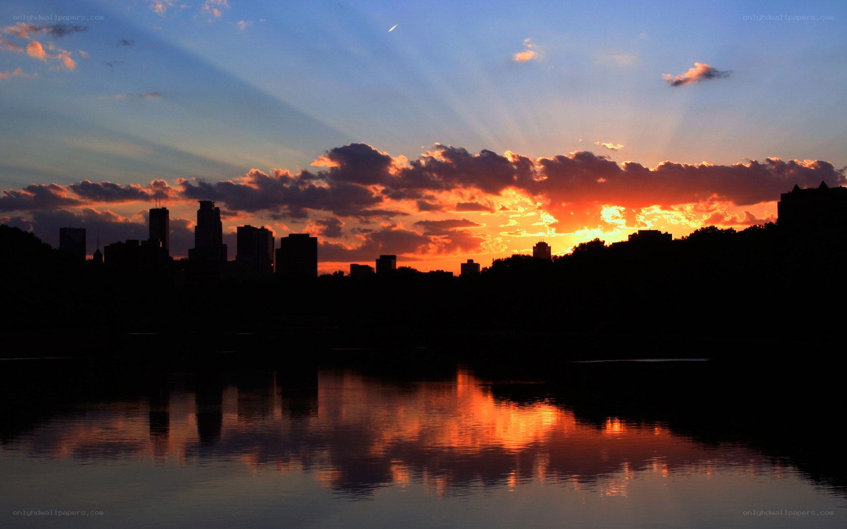 sunset over city skyline