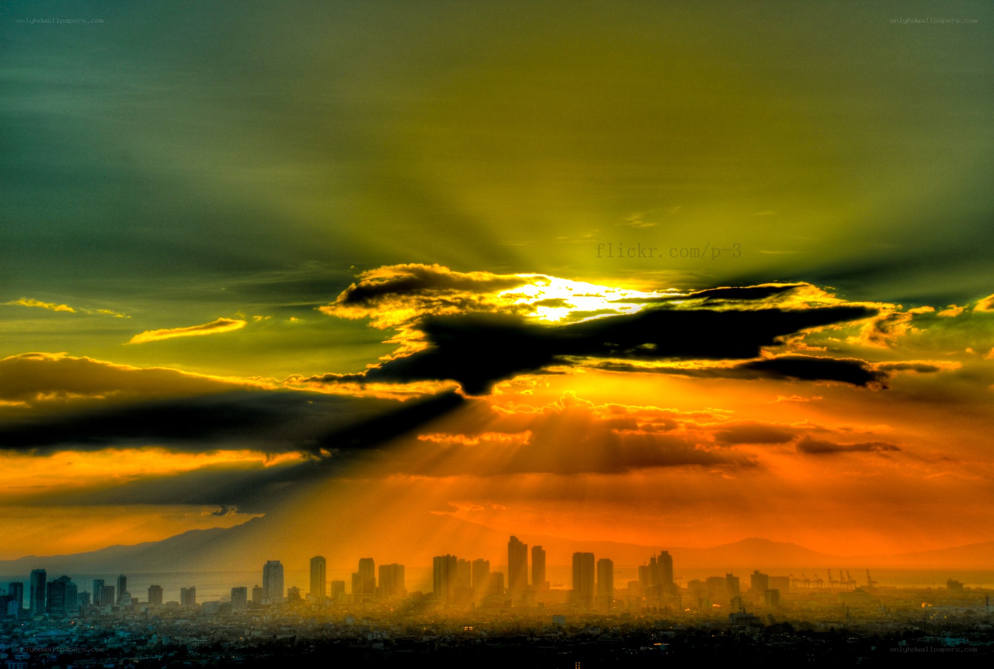 Sunset over city skyline