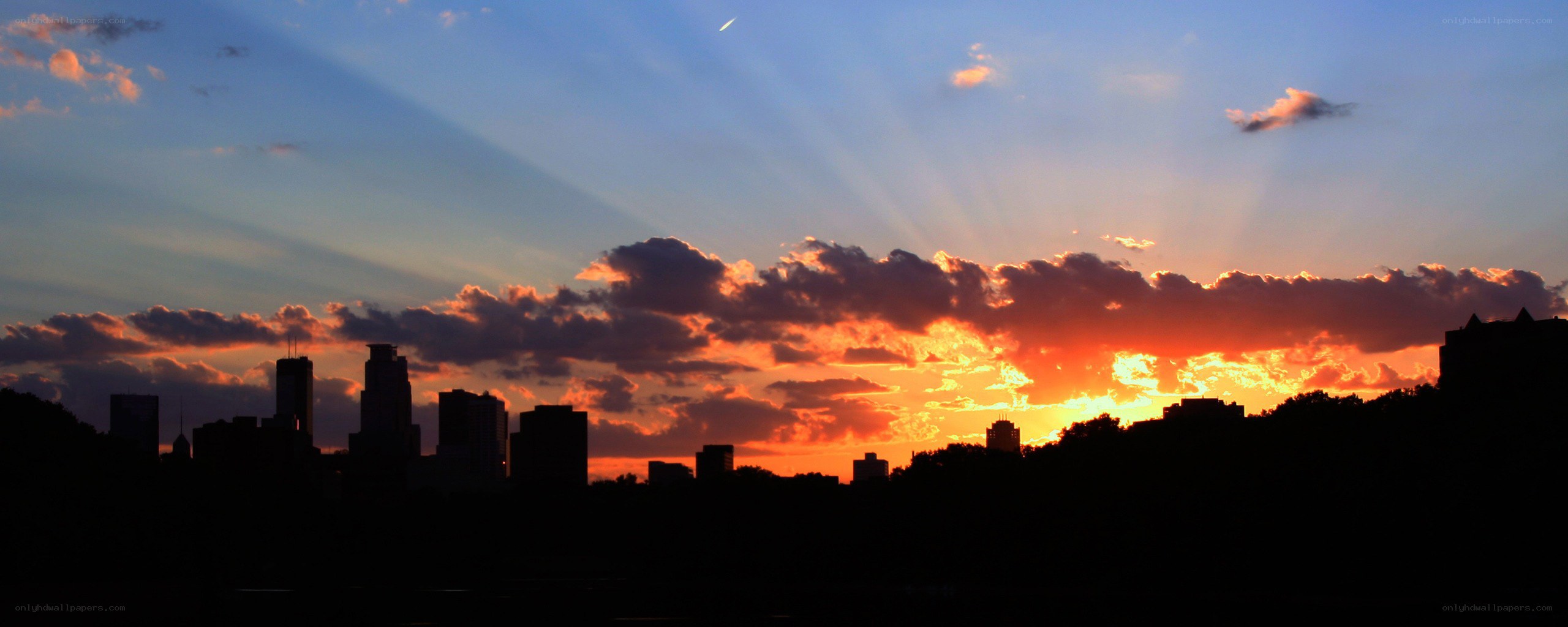 sunset over city skyline