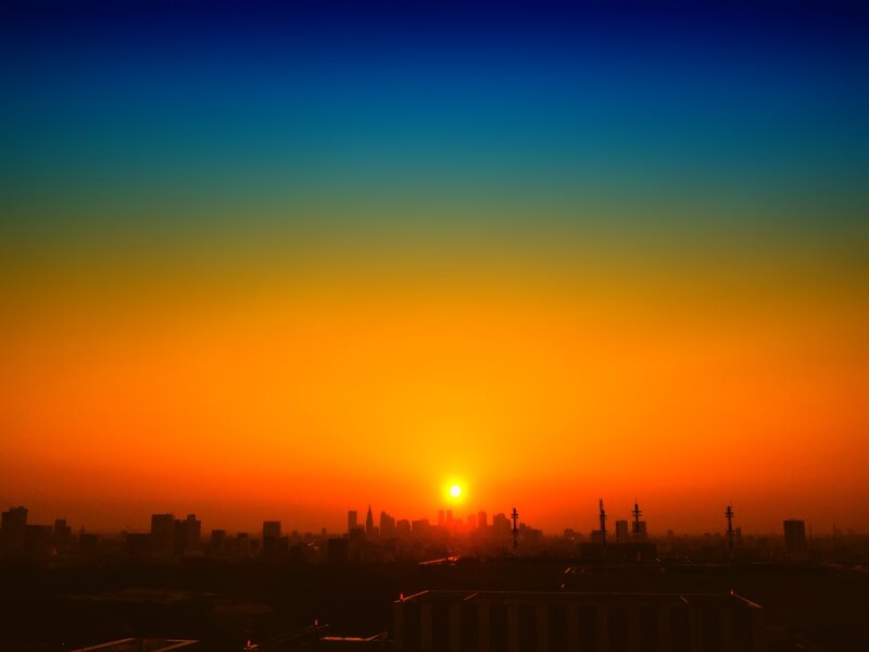 Sunset over city skyline
