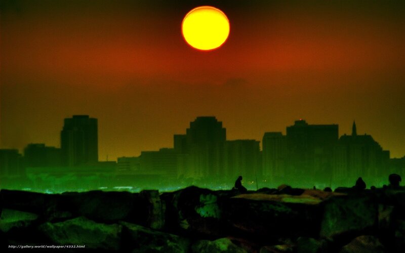 Sunset over city skyline