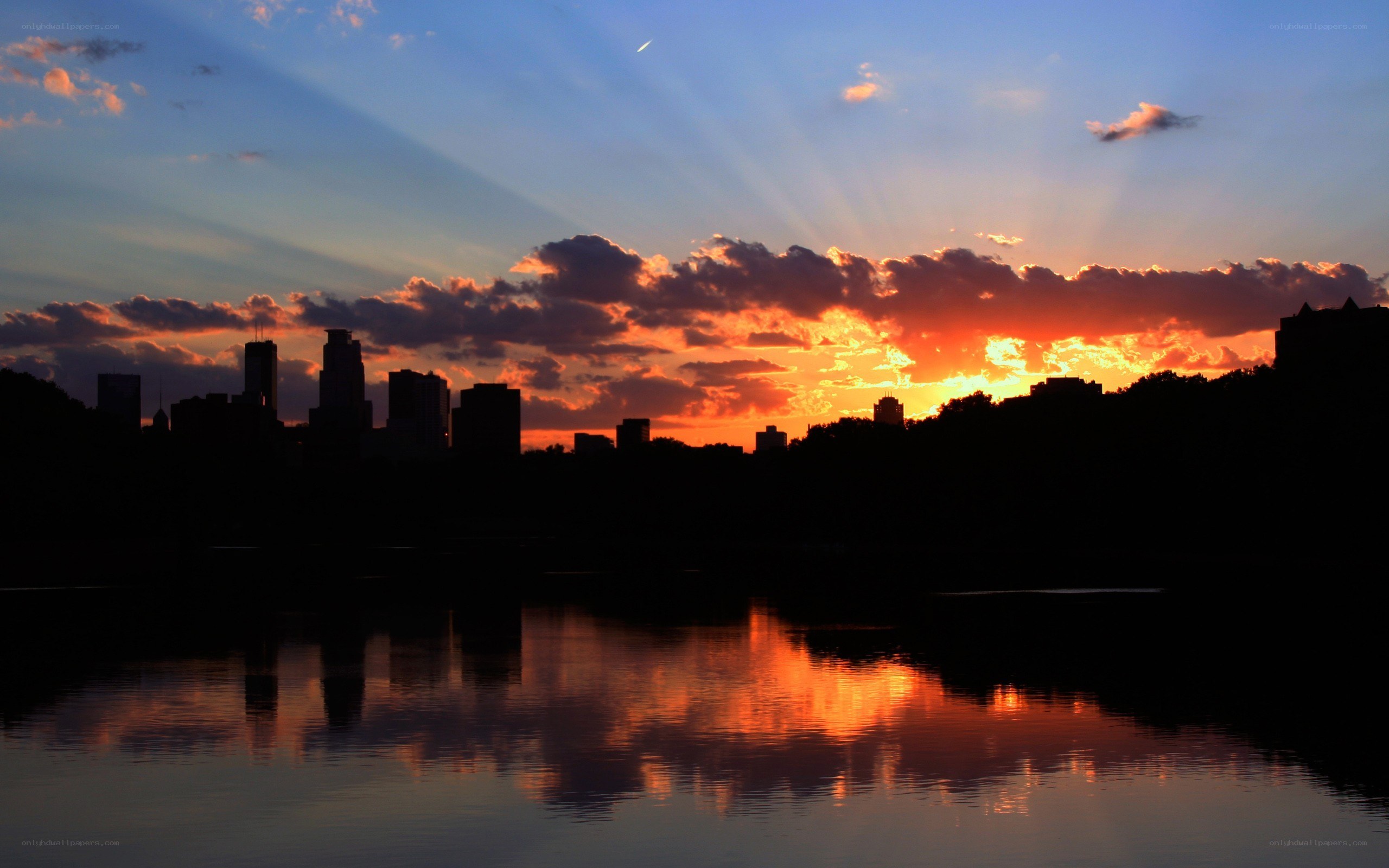 sunset over city skyline