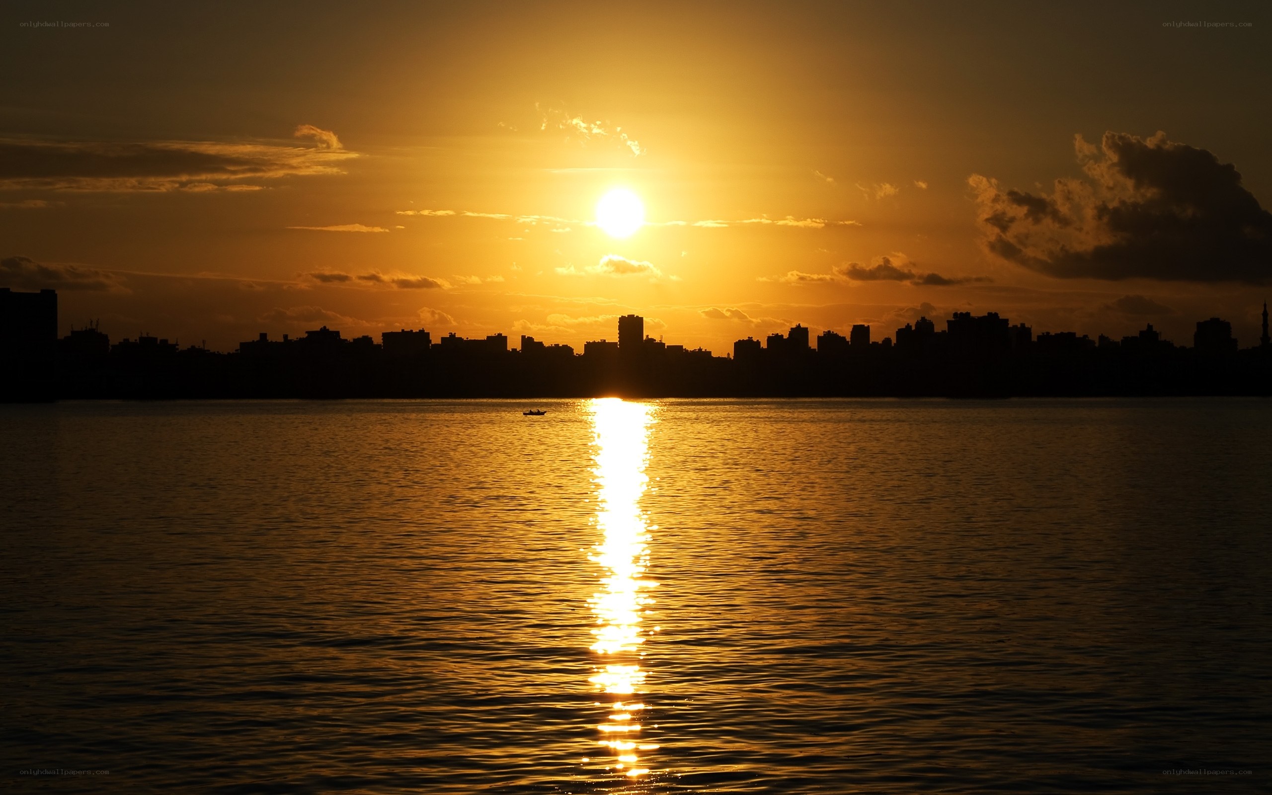 Sunset over city skyline