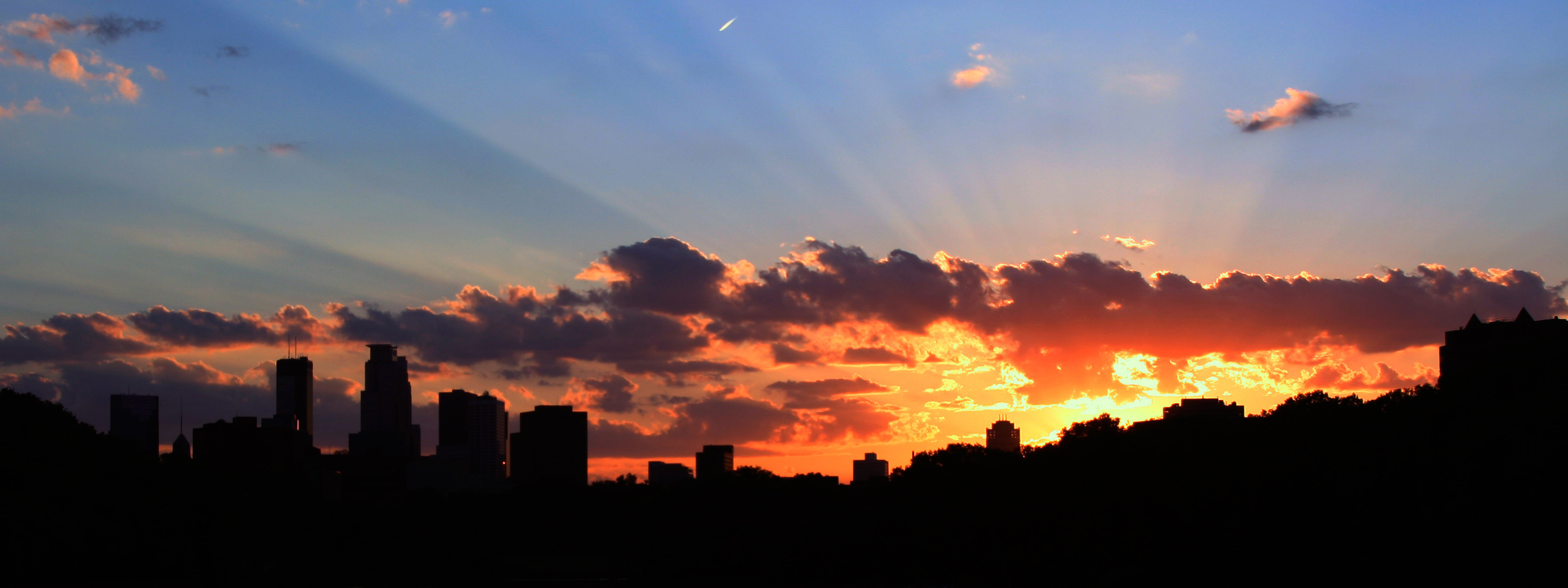 sunset over city skyline