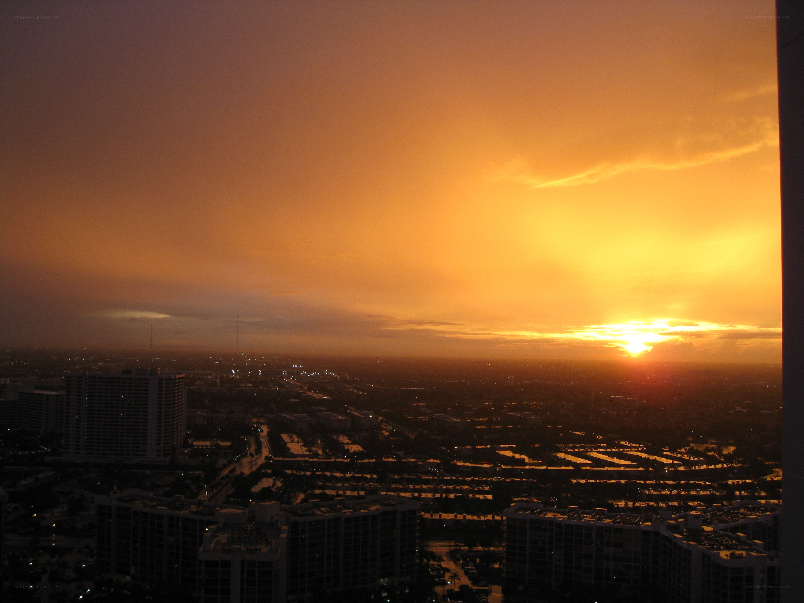 sunset over city skyline