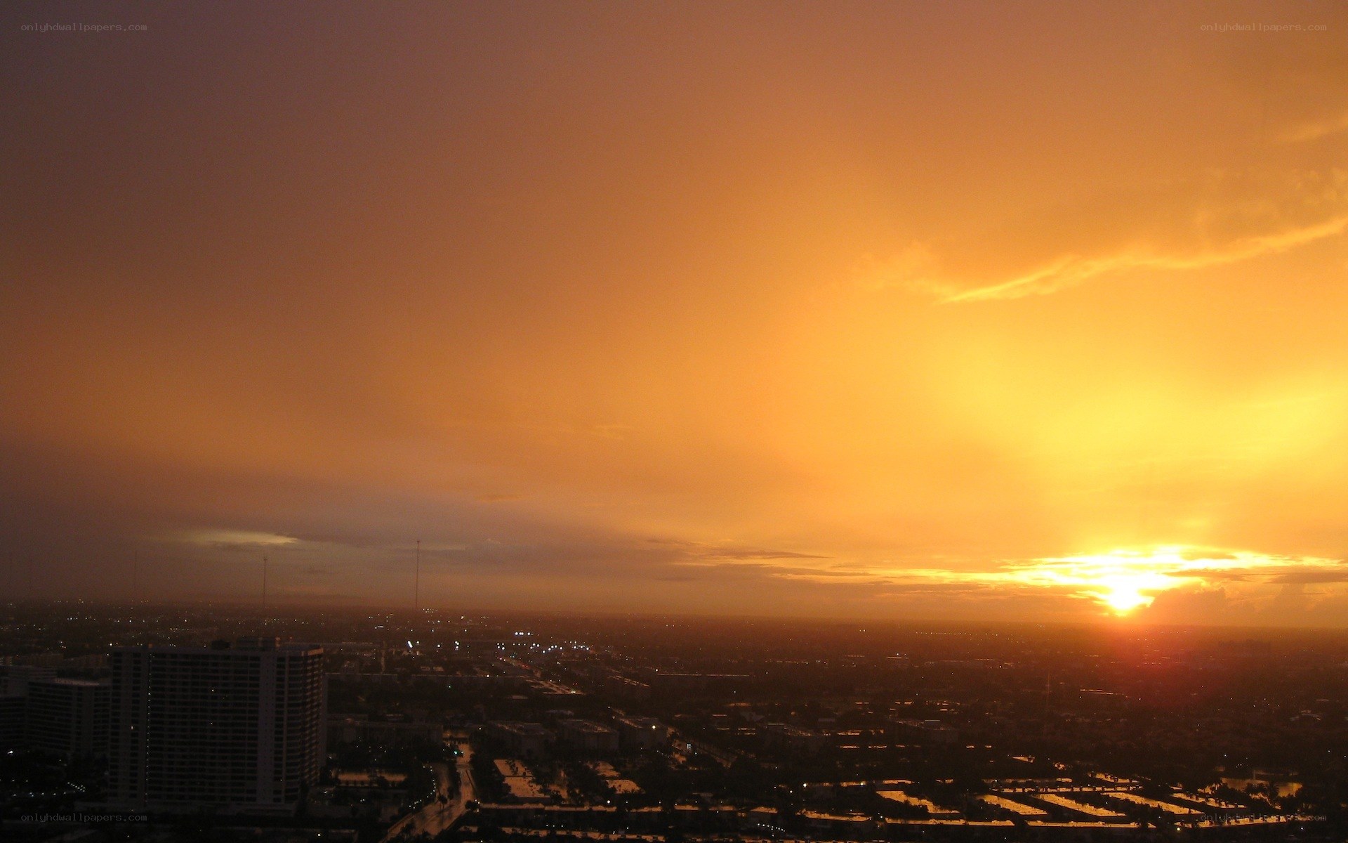 sunset over city skyline