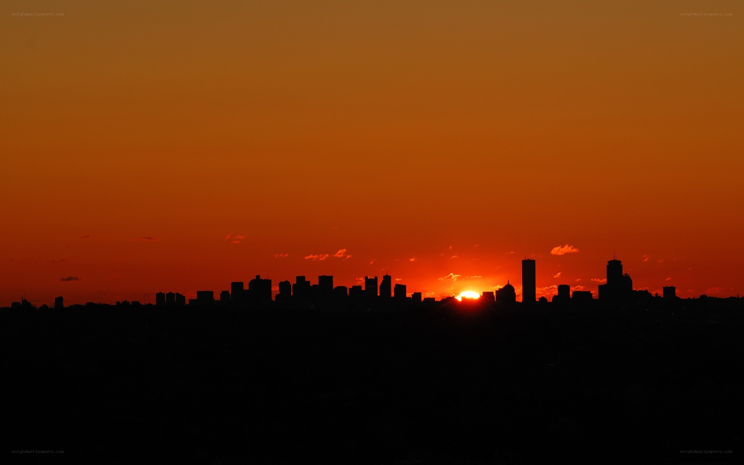Sunset over city skyline