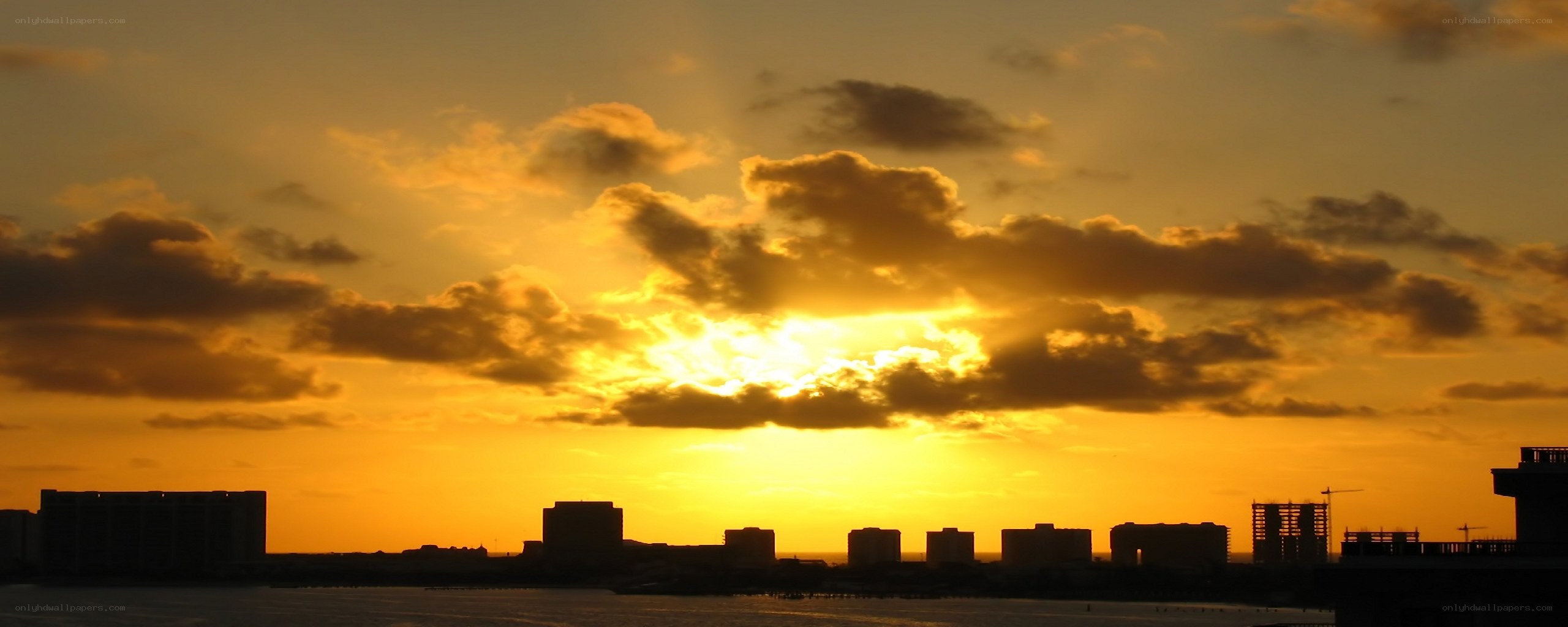 sunset over city skyline