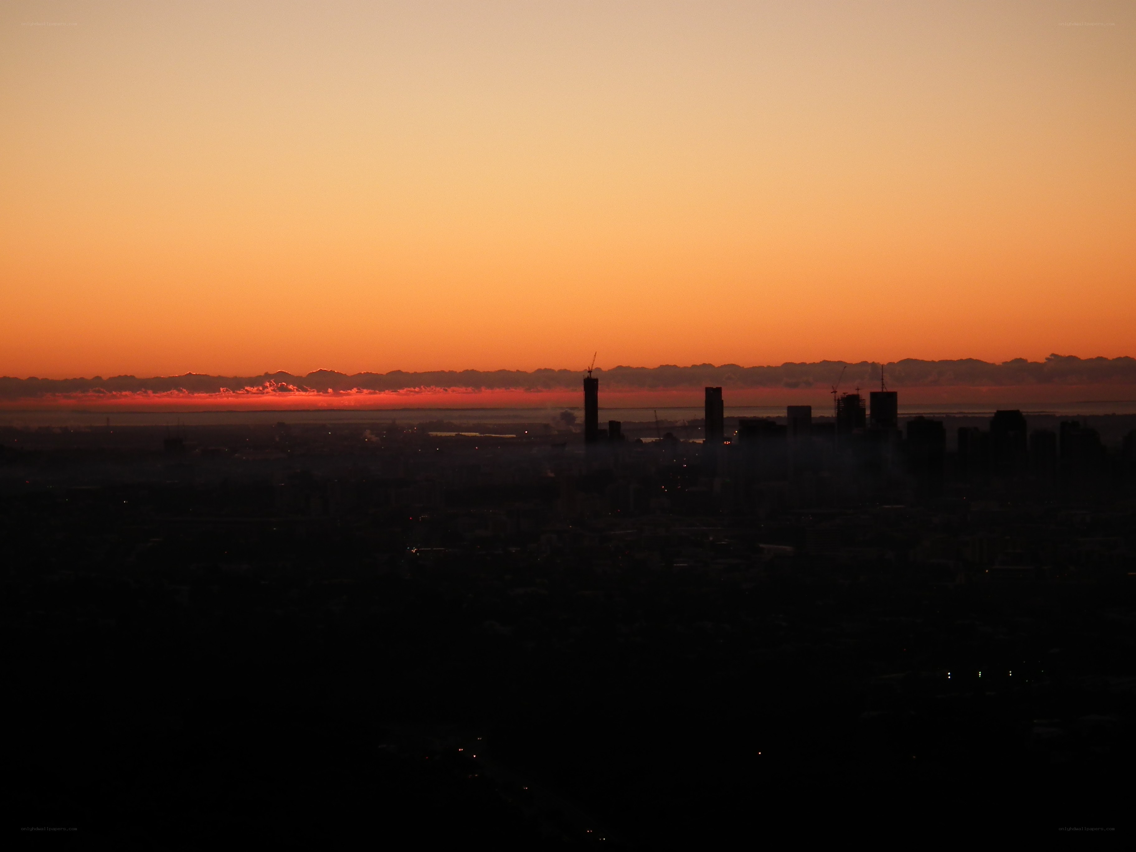 sunset over city skyline