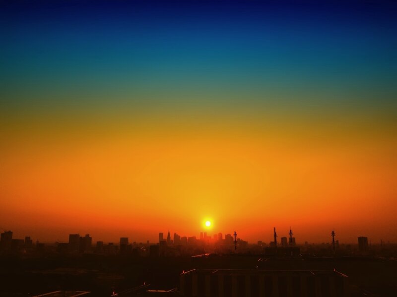 Sunset over city skyline