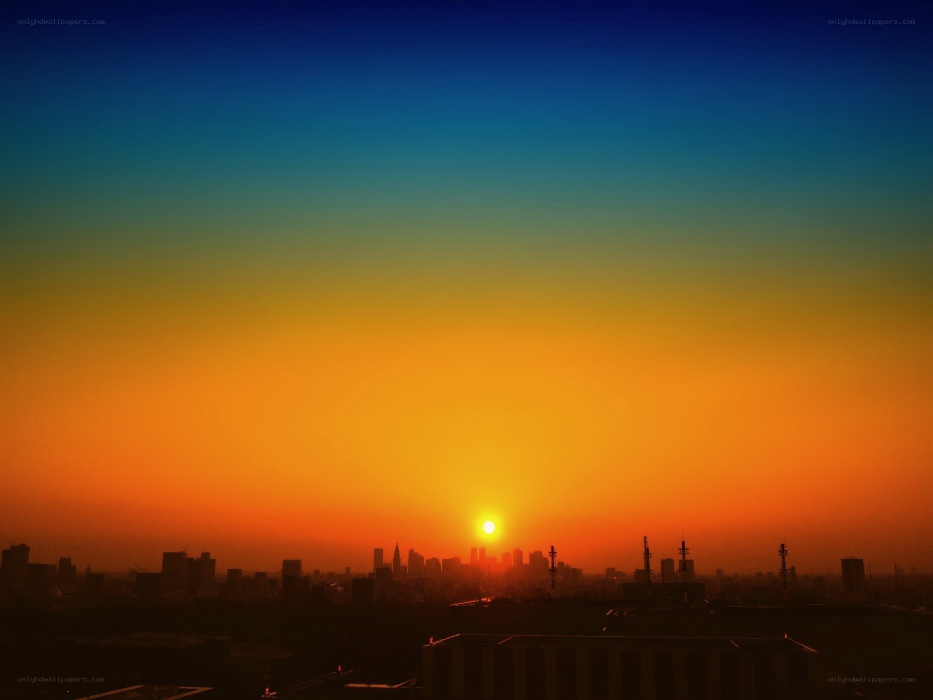 Sunset over city skyline