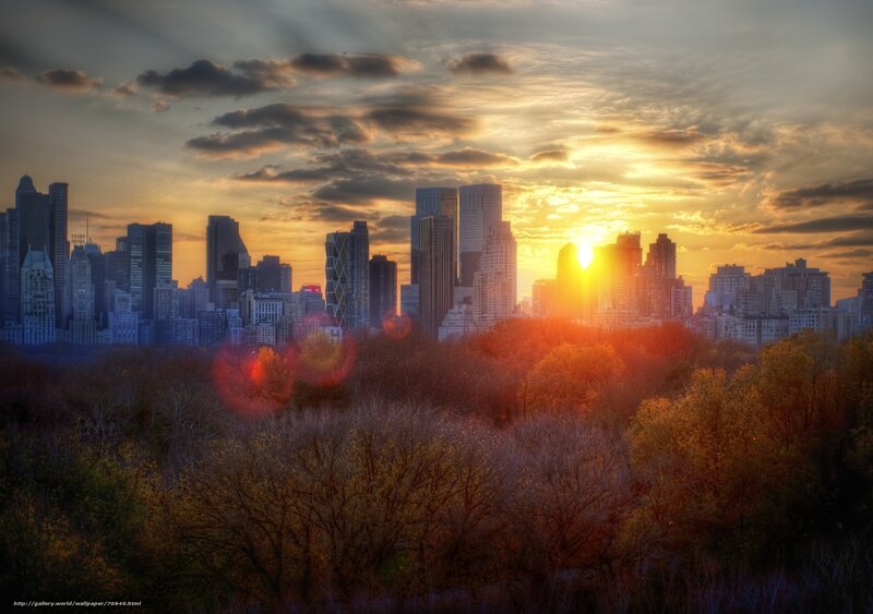 Sunset over city skyline