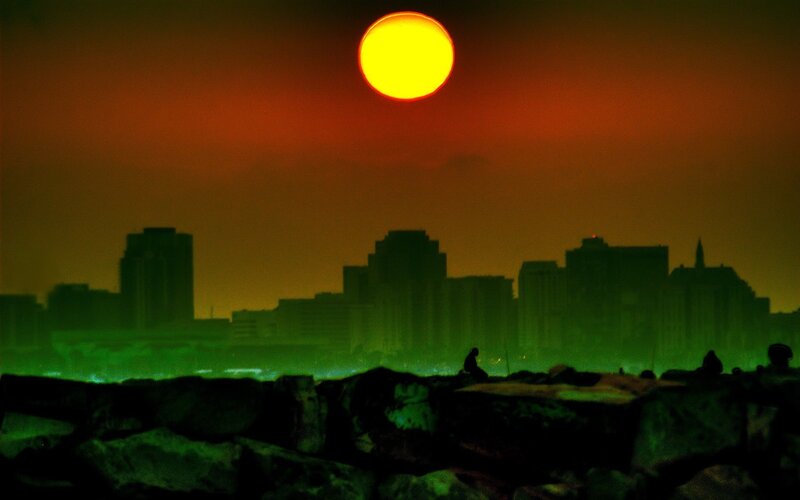 Sunset over city skyline