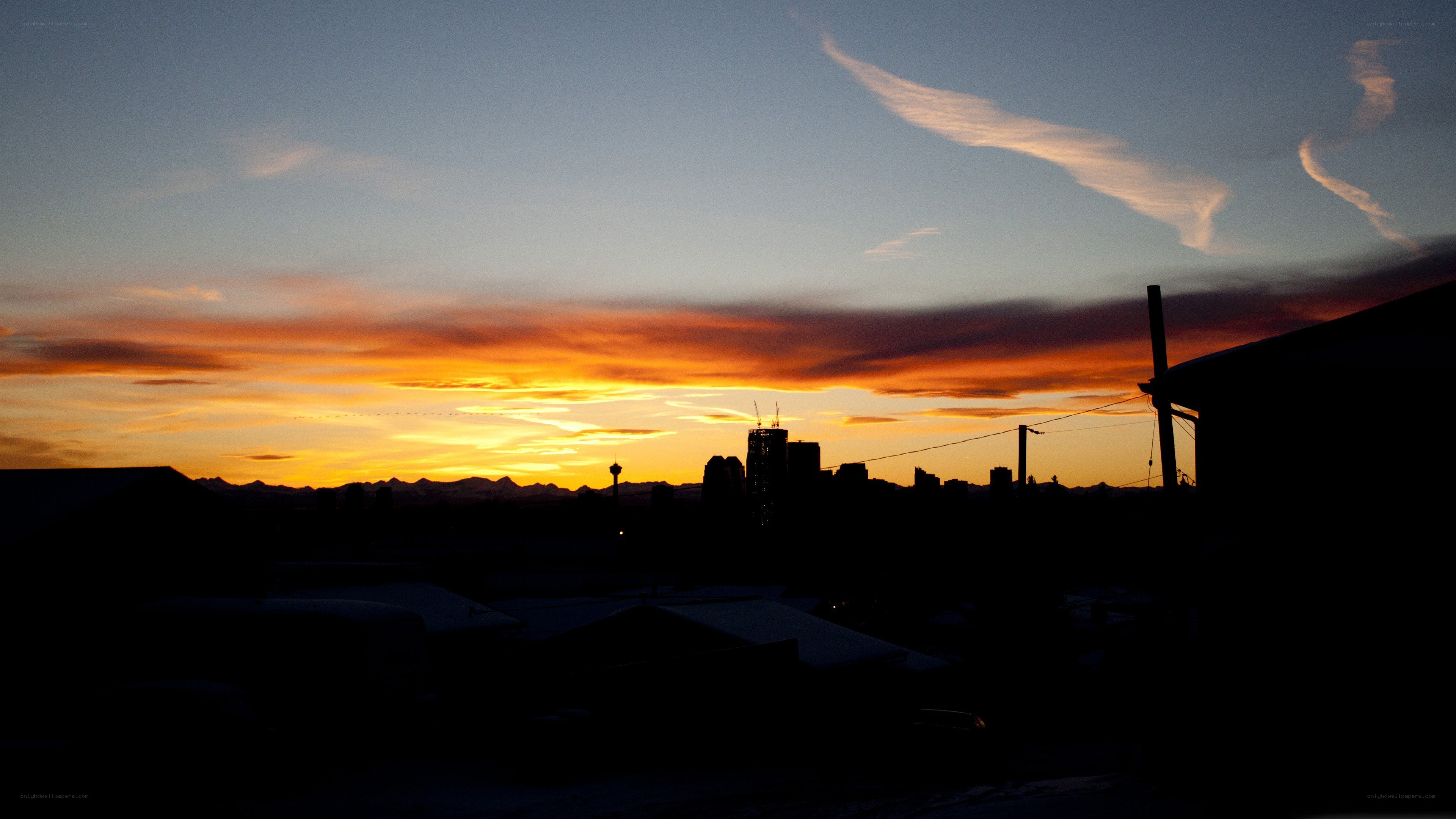 sunset over city skyline