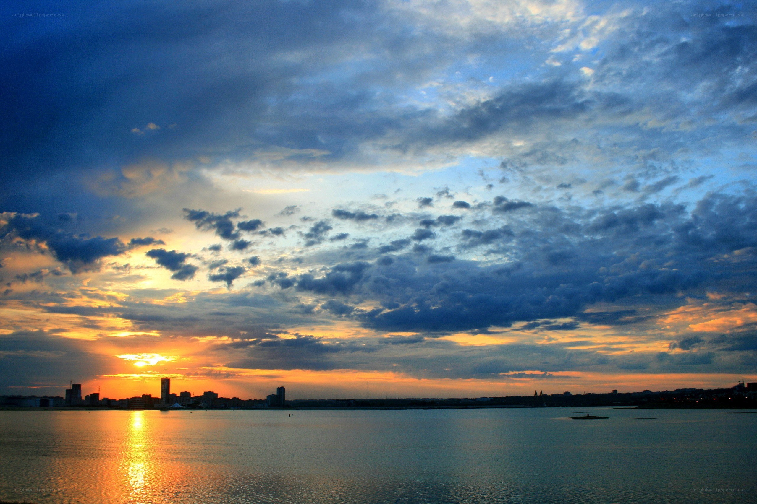 Sunset over city skyline