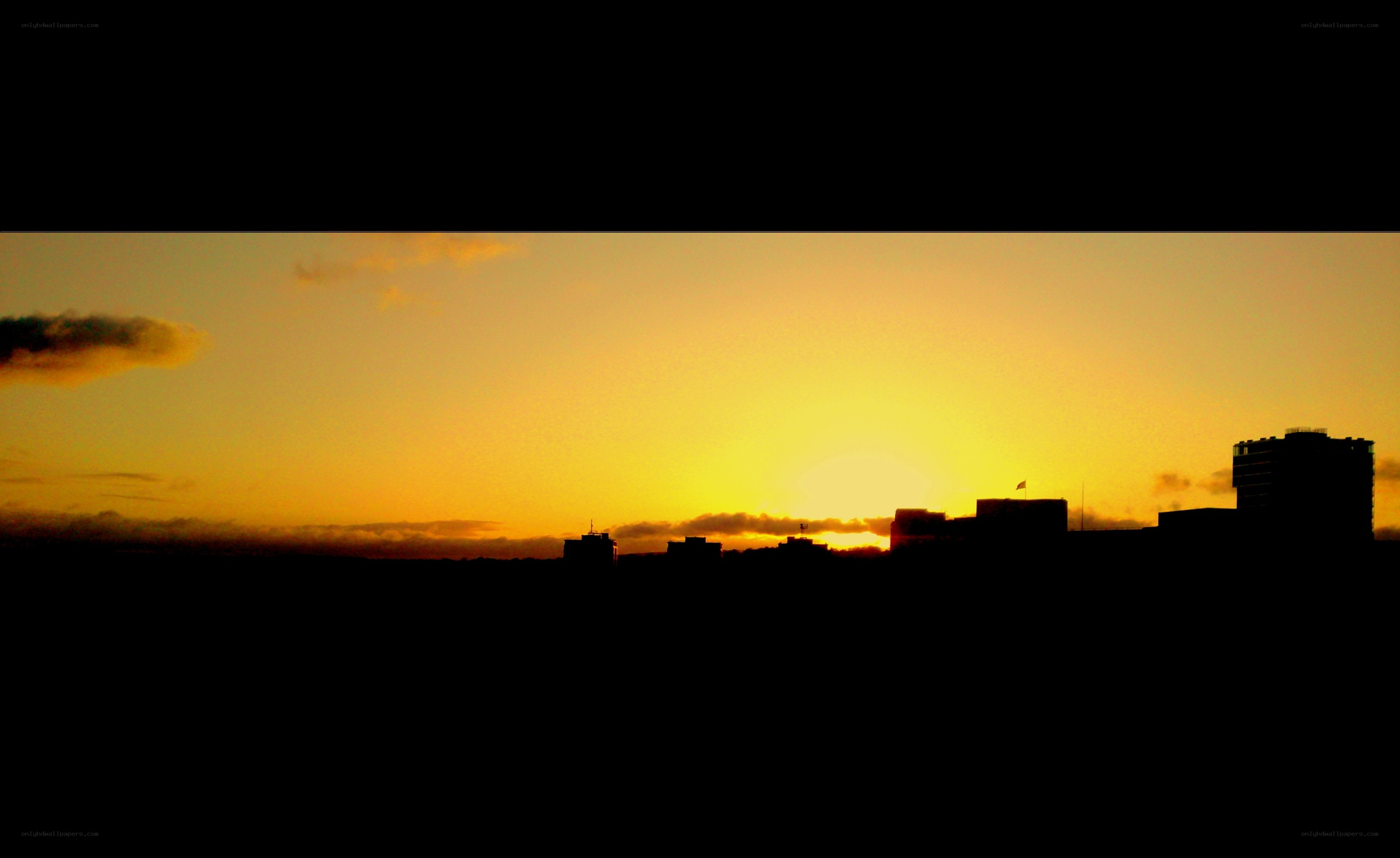 sunset over city skyline