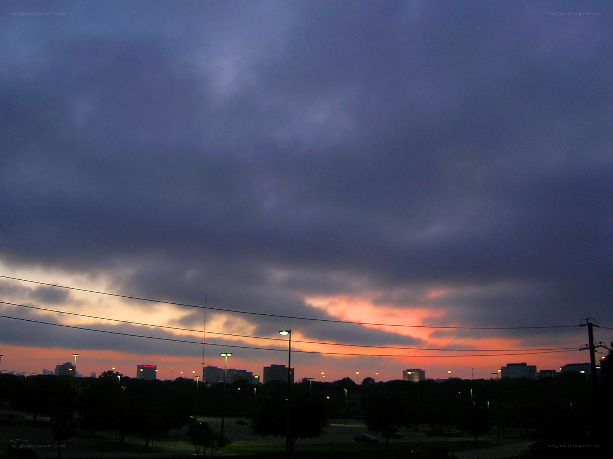 sunset over city skyline