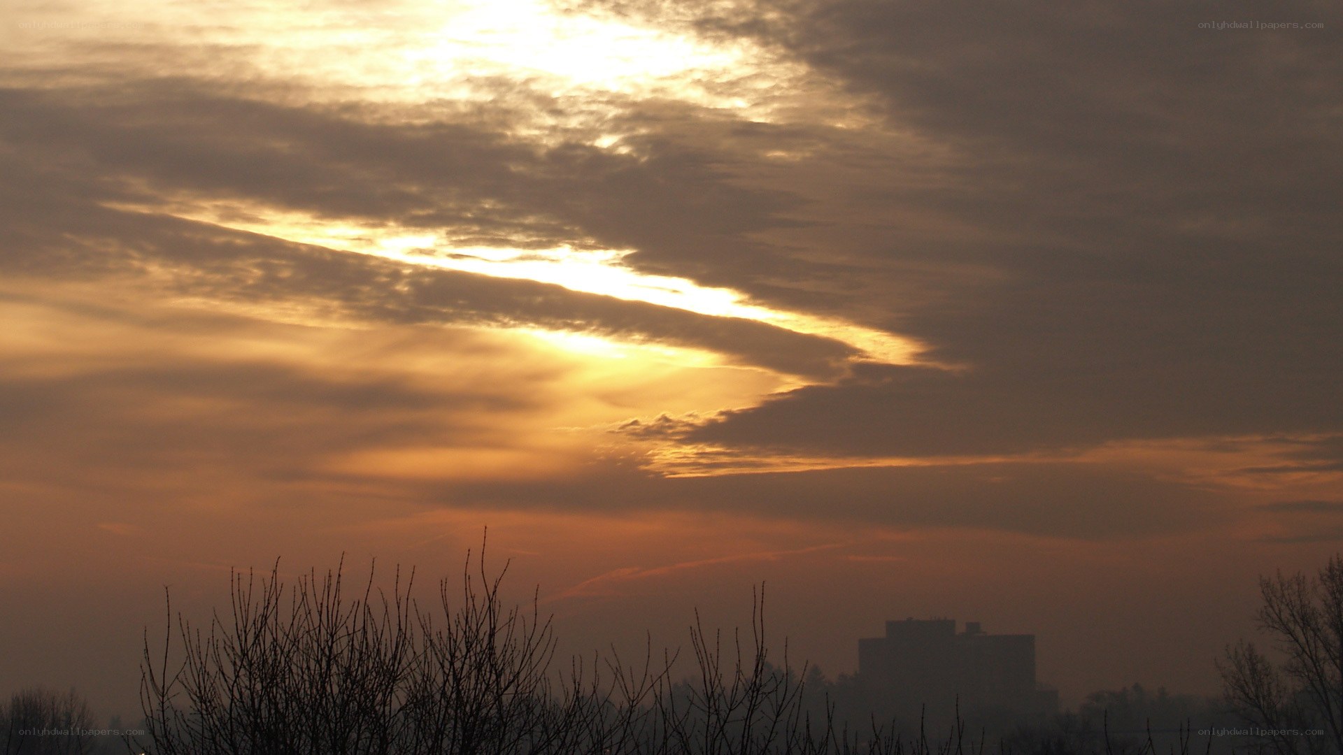 sunset over city skyline