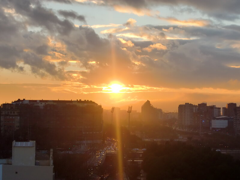 Sunset over city skyline