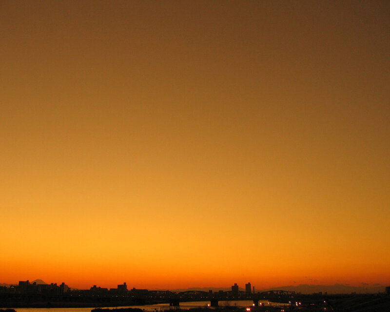 sunset over city skyline
