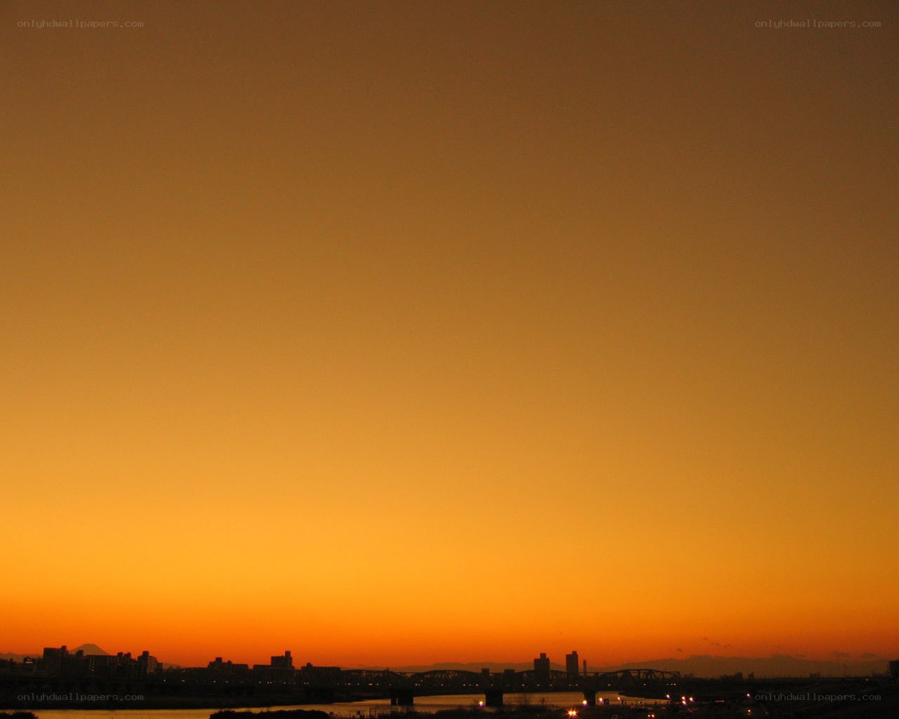 sunset over city skyline