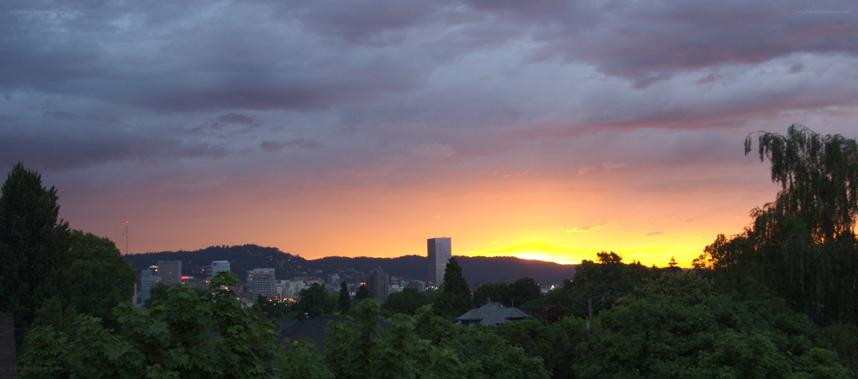 sunset over city skyline