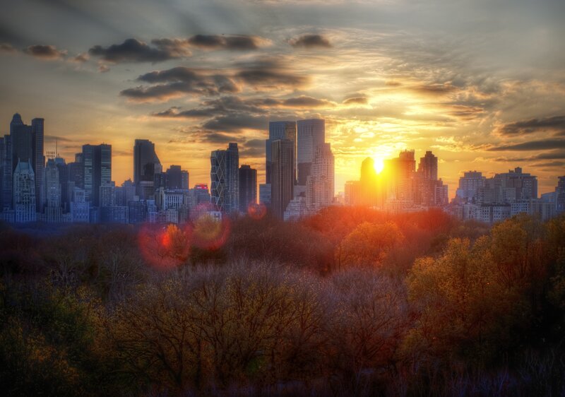 Sunset over city skyline