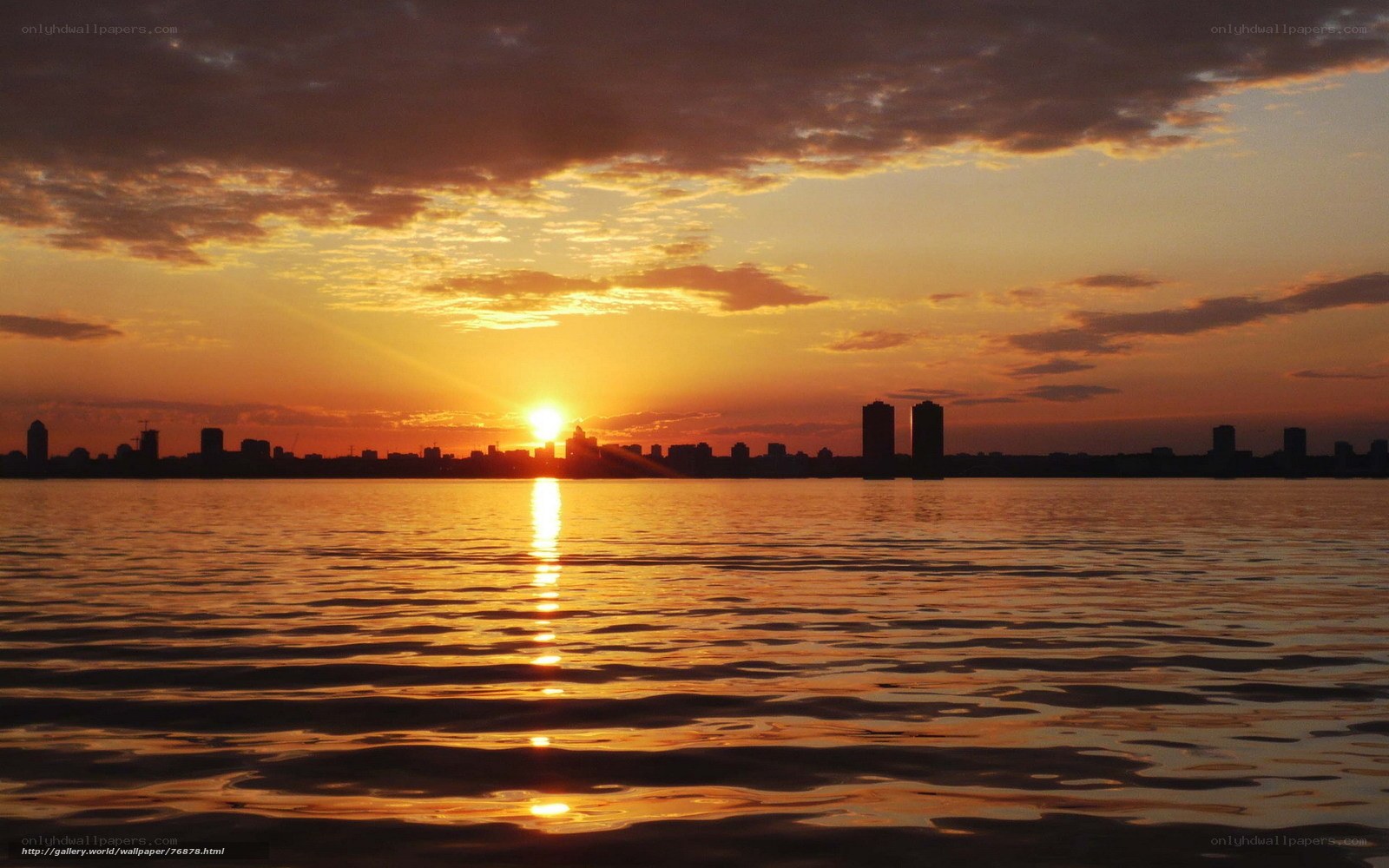 Sunset over city skyline
