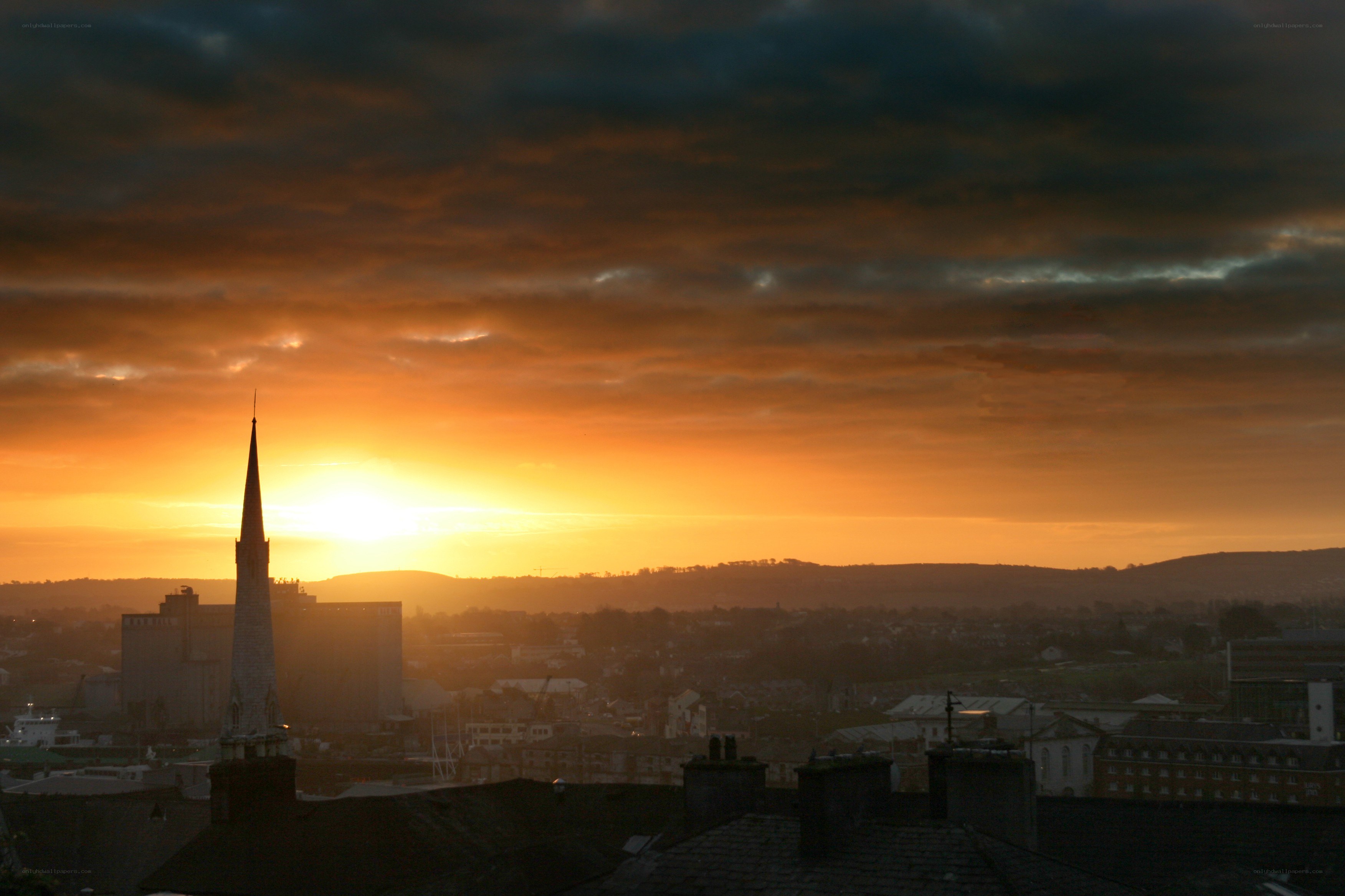 sunset over city skyline