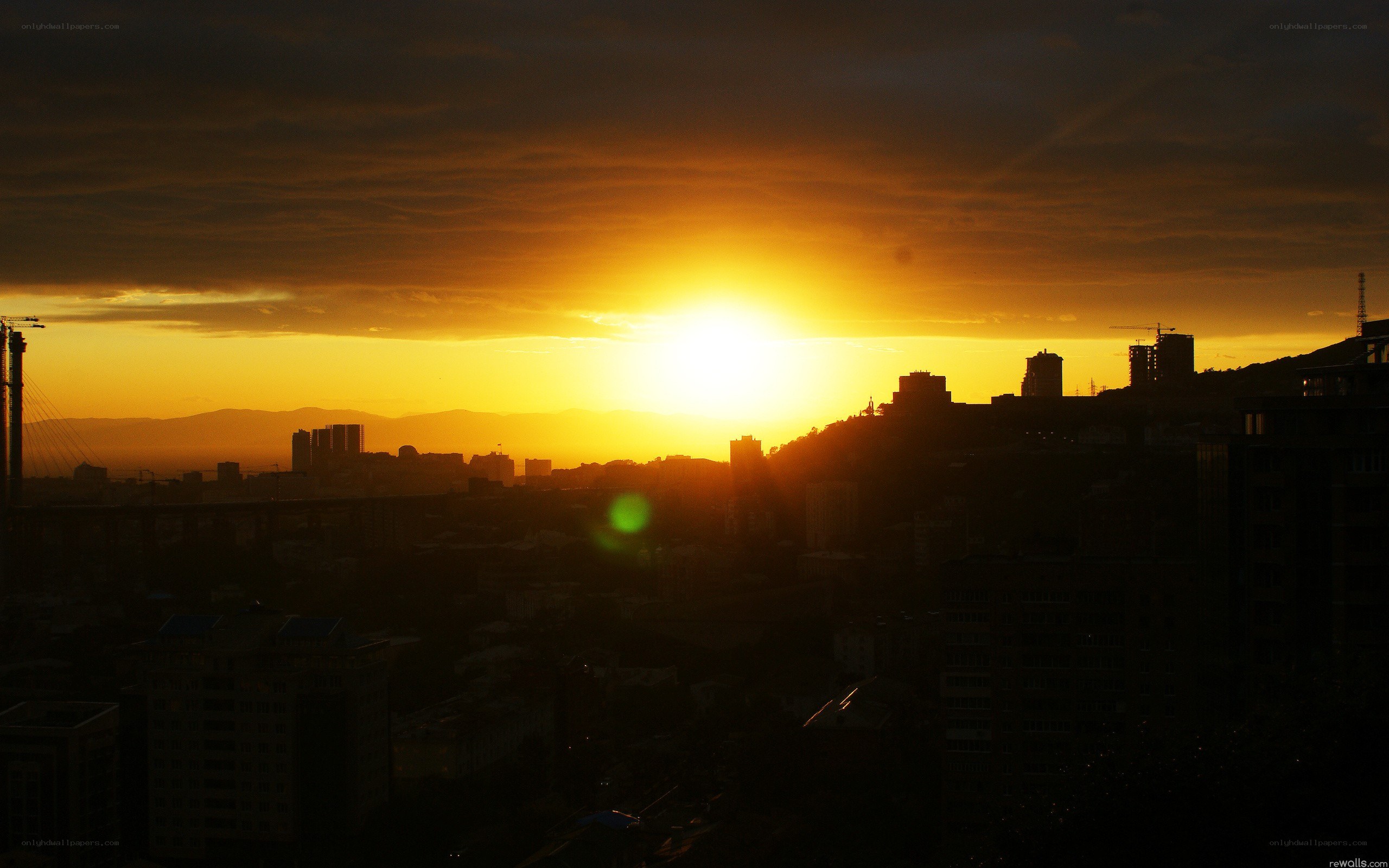 Sunset over city skyline