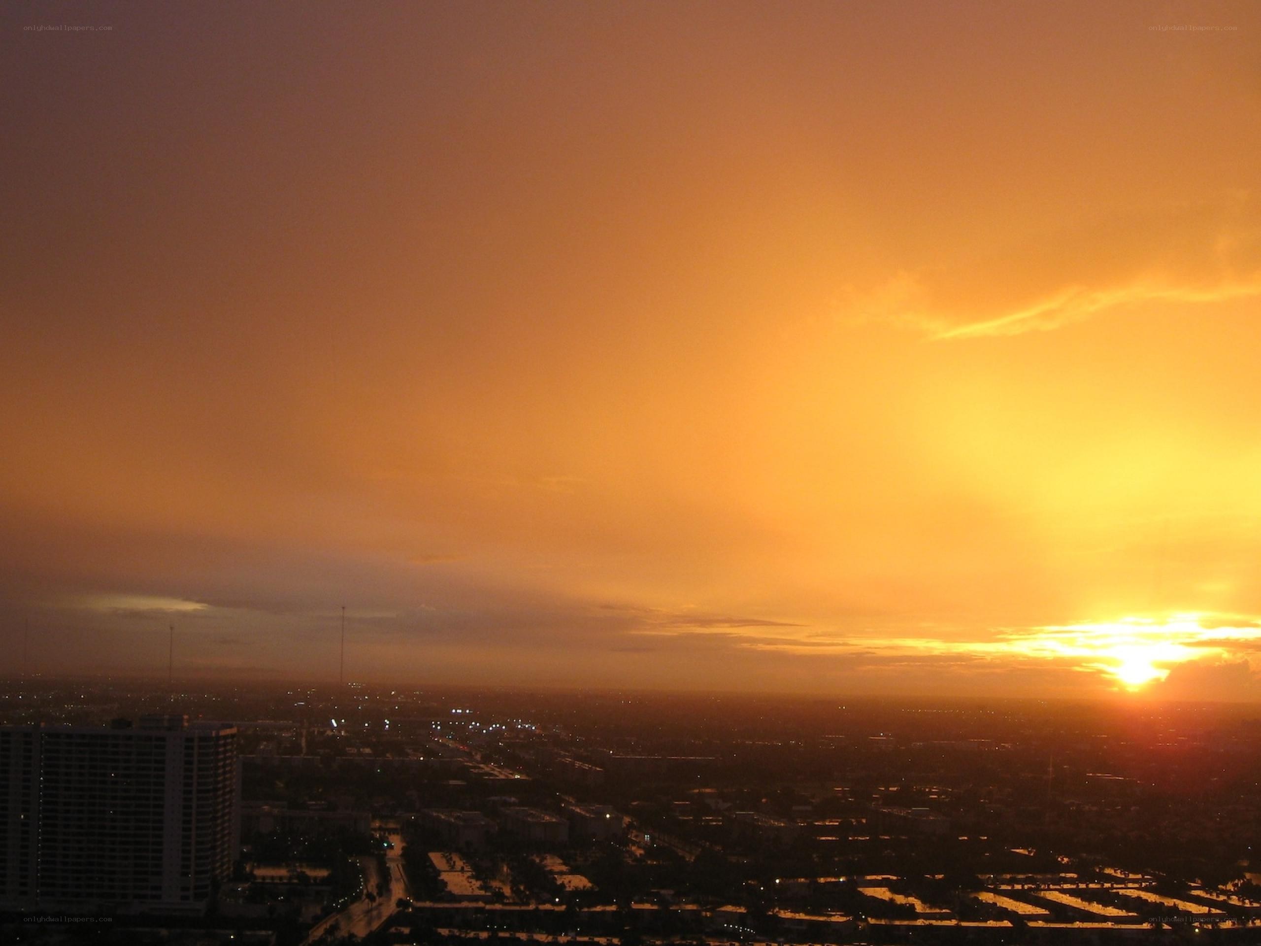 sunset over city skyline