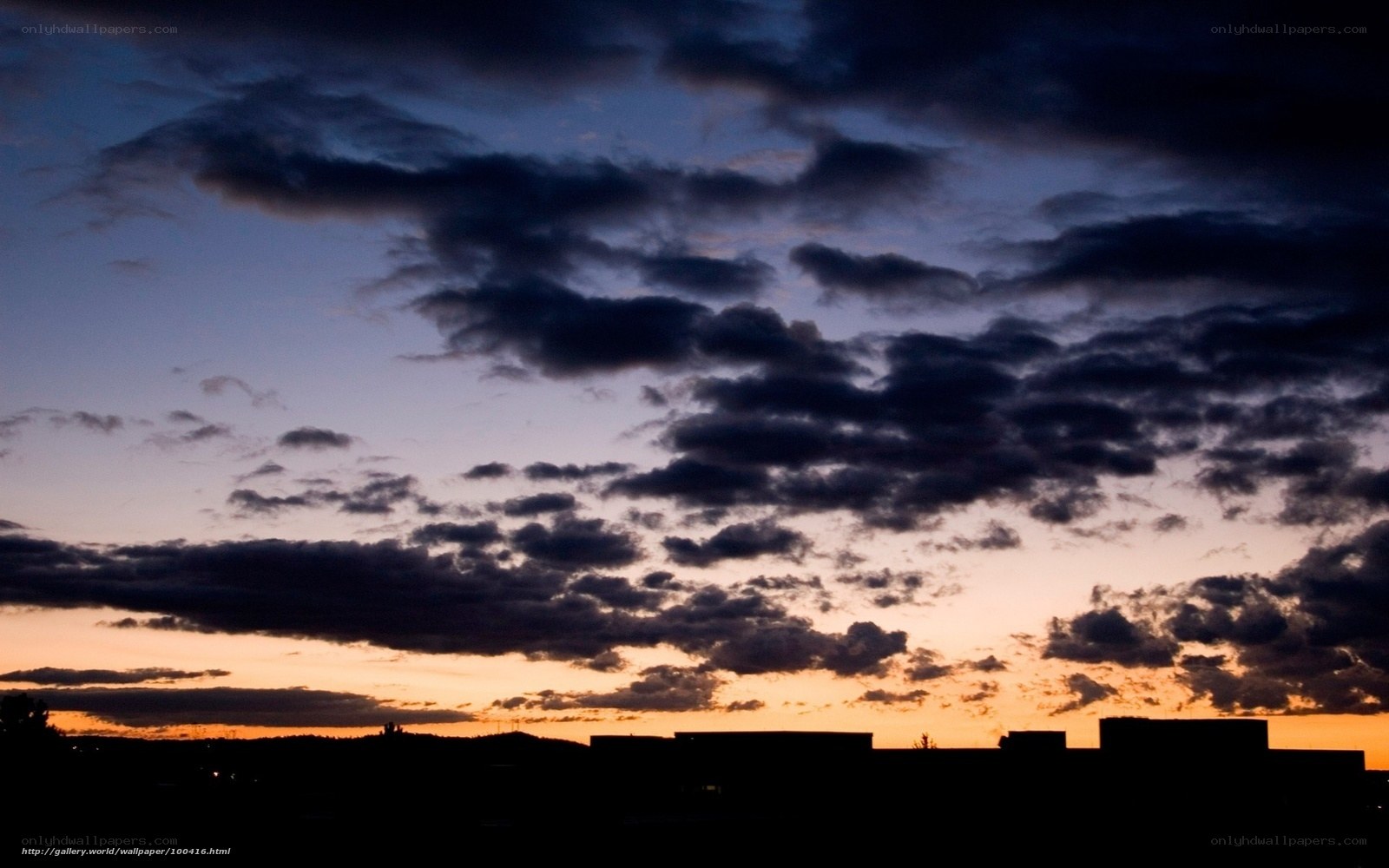 sunset over city skyline