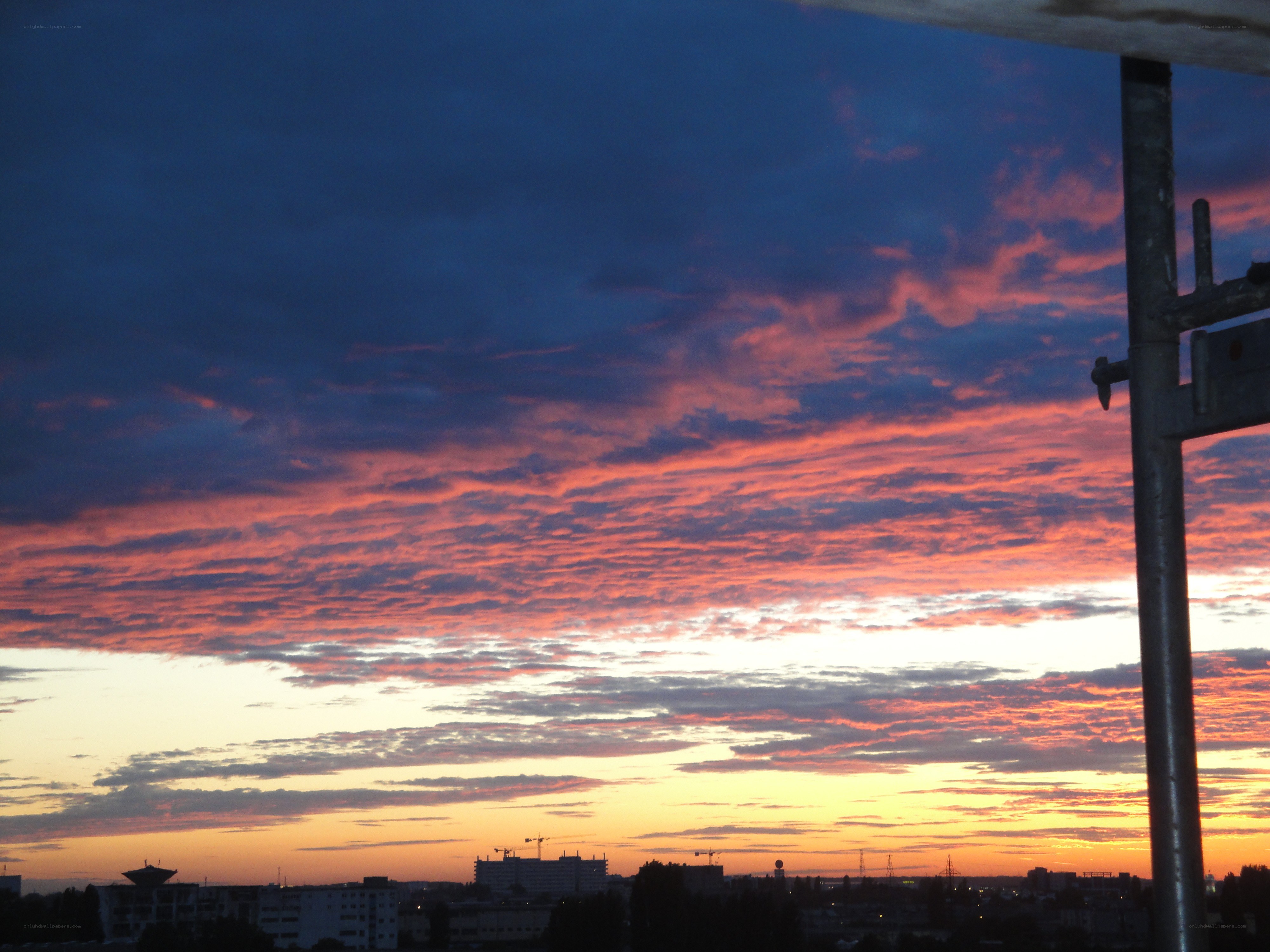 sunset over city skyline
