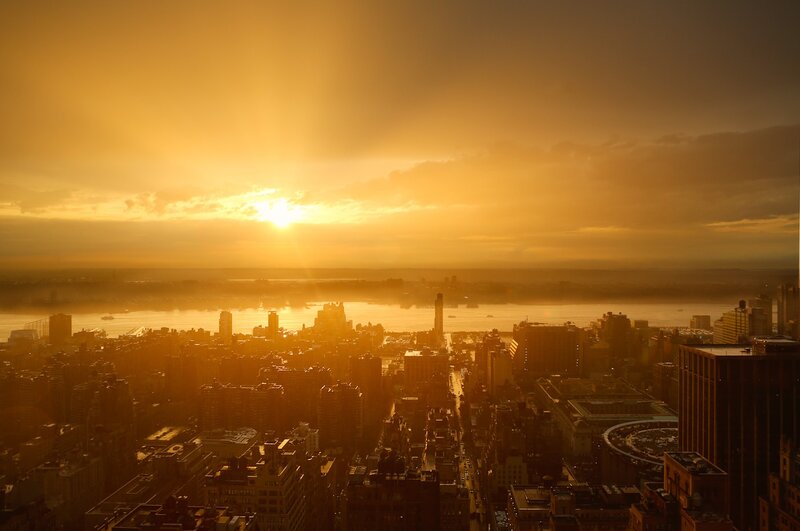 Sunset over city skyline