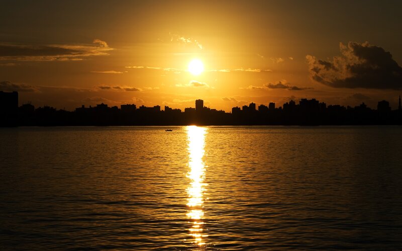 Sunset over City Skyline — Gold, Serene