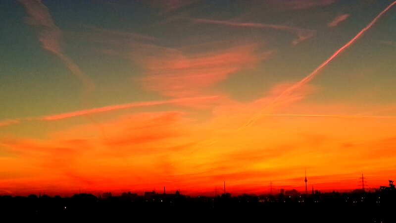 Sunset over City Skyline — Orange, Dramatic, Photograph, Sky