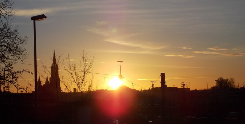Sunset over City Skyline — Orange, Dramatic, Photograph, Streetlight