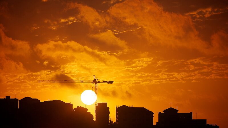 Sunset over City Skyline — Orange, Dramatic, Photograph, Sun, Crane