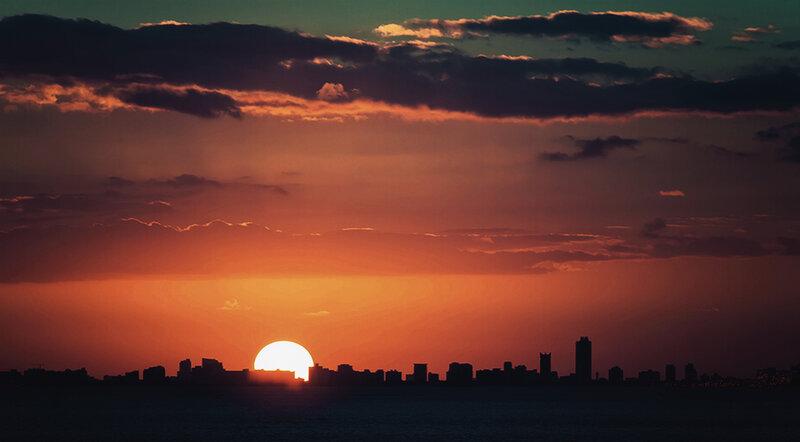 Sunset over City Skyline — Orange, Dramatic, Photograph, Sun