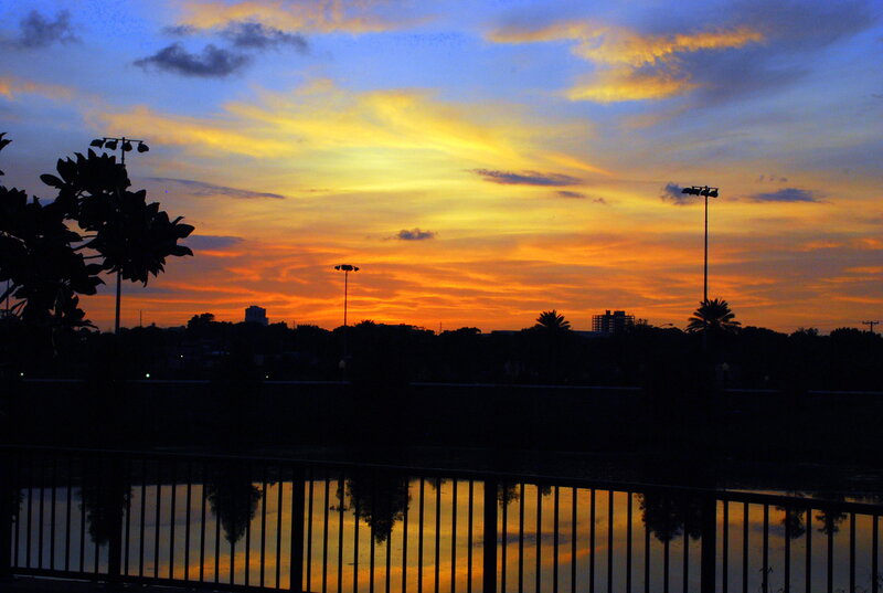 Sunset over City Skyline — Orange, Dramatic, Photograph