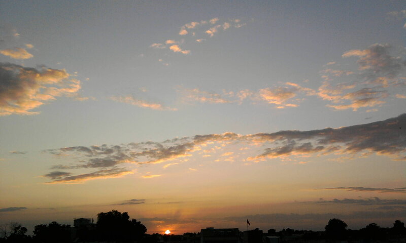 Sunset over City Skyline — Orange, Serene, Photograph, Clouds, Buildings