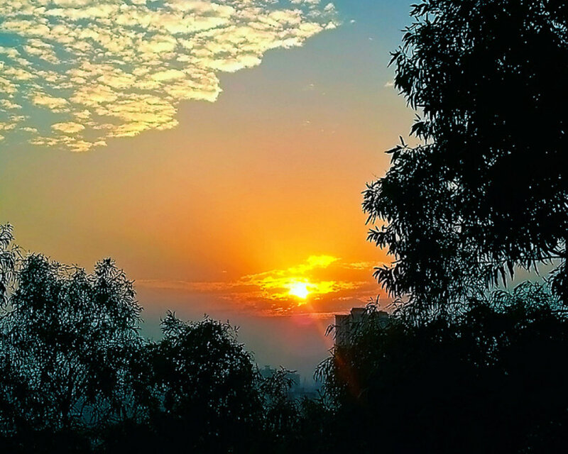 Sunset over City Skyline — Orange, Serene