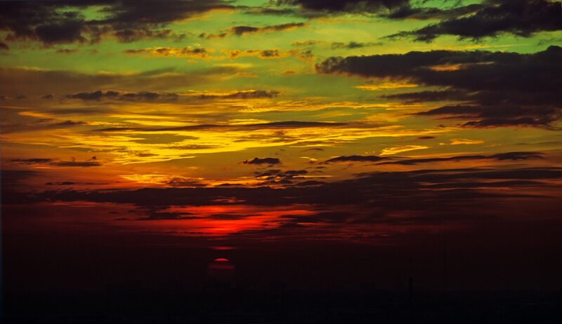 Sunset over City Skyline — Red, Dramatic