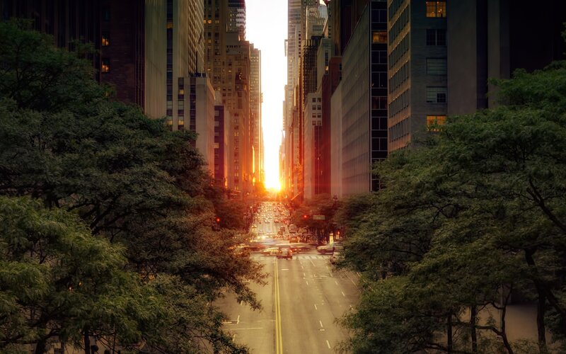 Sunset over city street