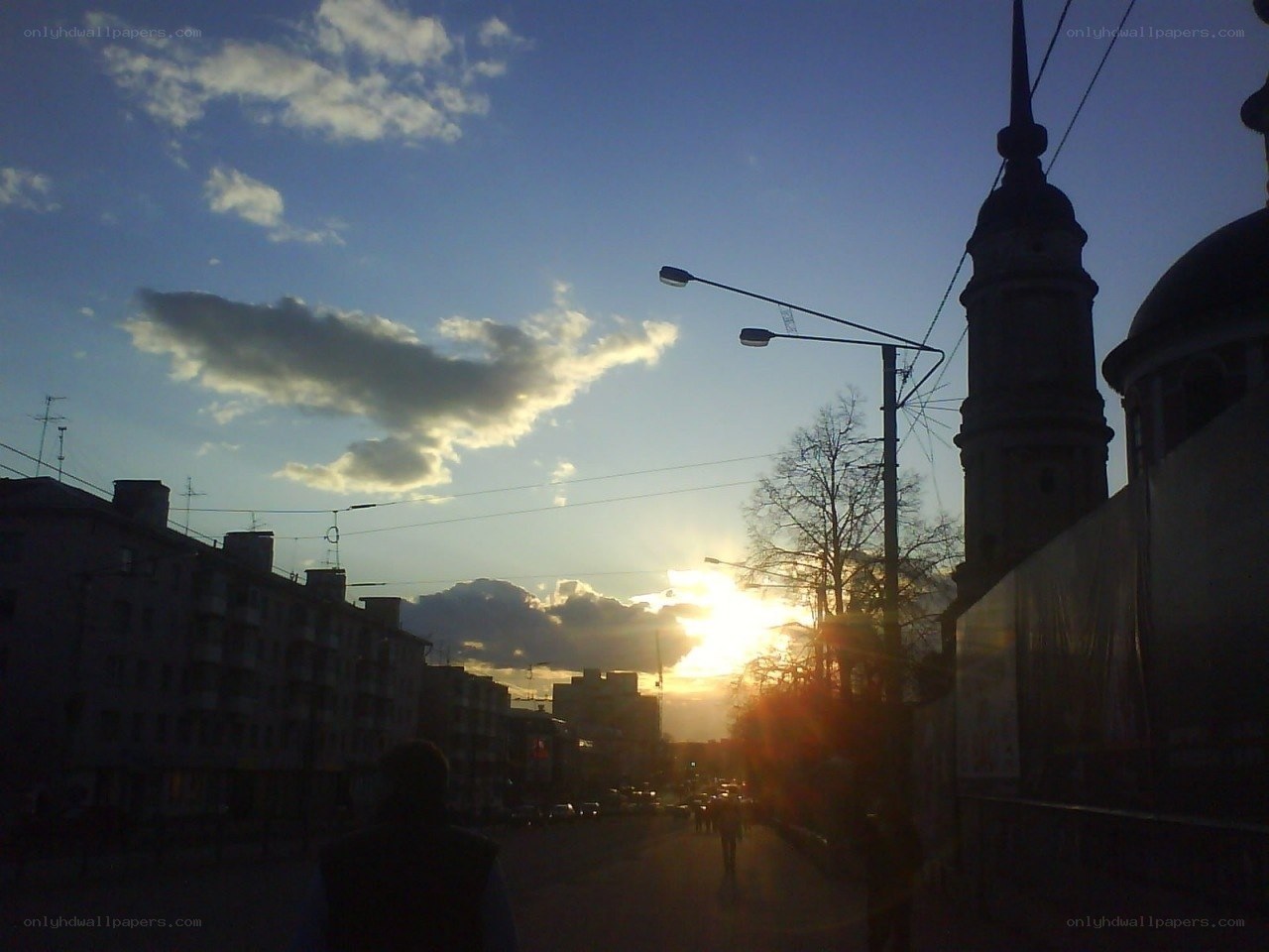 Sunset over city street