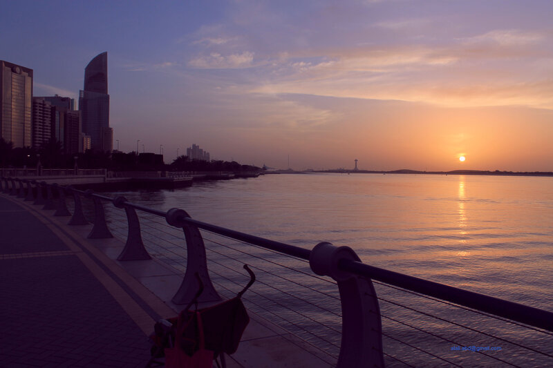 Sunset over City Waterfront — Orange